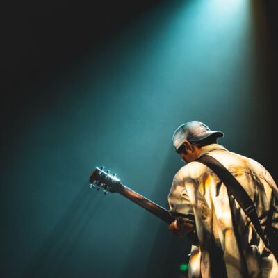 902x528 man and guitar